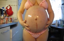 Huge pregnant belly on webcam